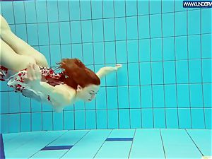 sizzling grind ginger-haired swimming in the pool